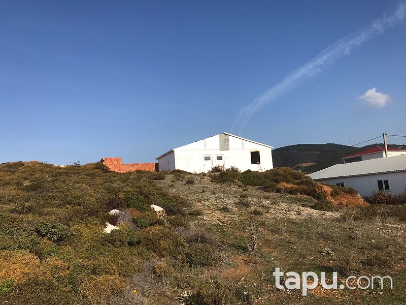 Armutlu'da Deniz Manzaralı Tepe Konumlu Ticaret İmarlı Arsa Yatırımı